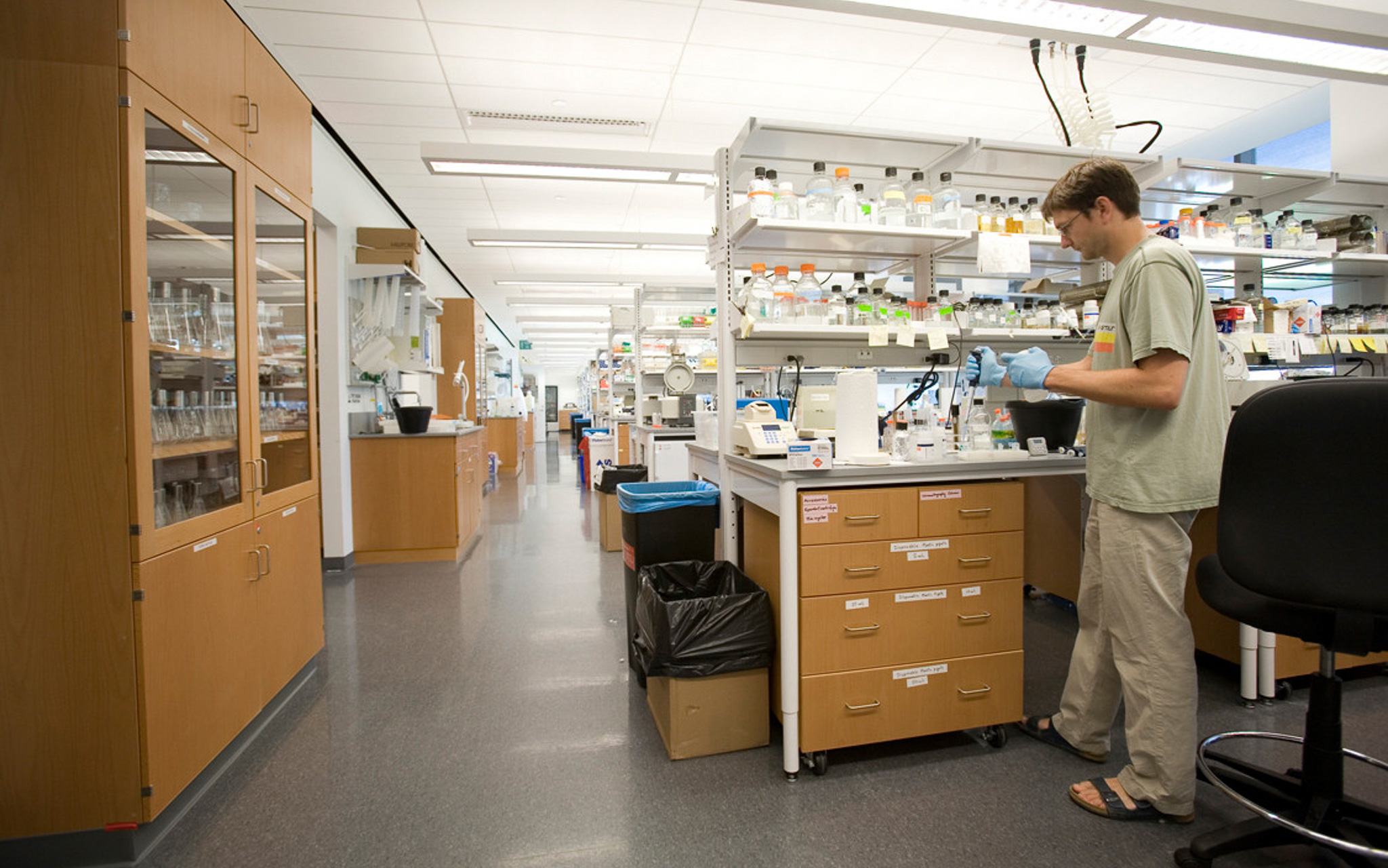 Student working in Birkenstocks in Weill Hall's labs