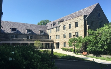 The courtyard of Hughes Hall, showing the stone exterior