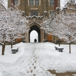 Snowy footprints leading to Baker Tower