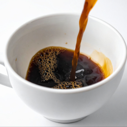 Coffee cup with coffee in it