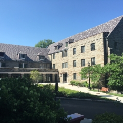 The courtyard of Hughes Hall, showing the stone exterior