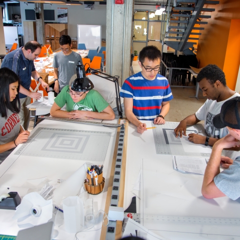 Students work on projects at a 2017 Rev Hardware Accelerator.