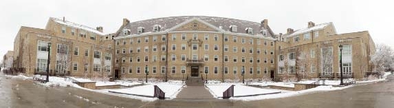 Panorama of Martha Van Rensselaer Hall with snow on the ground