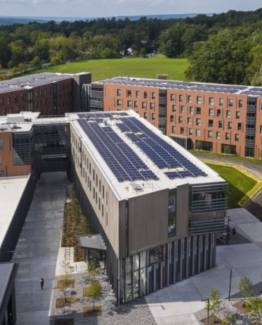 New residence halls on North Campus at Cornell as seen from above, with solar panels covering all roofs
